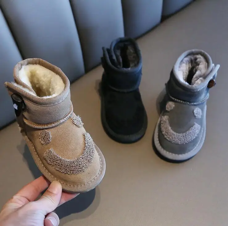 

2019 winter children's leather snow boots wild girls warm boots non-slip plus velvet smile baby cotton shoes