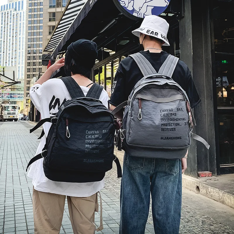 

Cross-border Trend Men's Backpack 2021 Popular Cool Oxford Cloth Female Leisure Sports Large-capacity Student Schoolbag