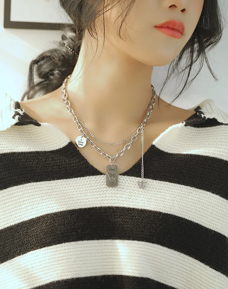

New Korean fashion cold wind titanium steel necklace female niche temperament sweater chain pendant