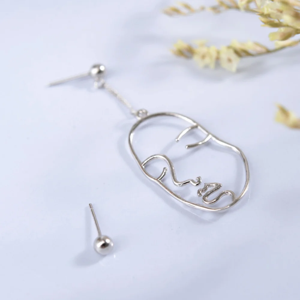 Женские абстрактные асимметричные серьги длинные висячие в форме лица (золотые) |