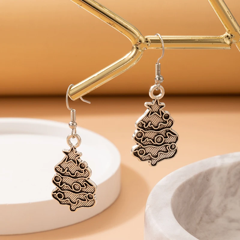 

Docona, новинка, висячие серьги в виде рождественской елки для женщин, искусственная геометрия, звезда, металлические ювелирные изделия для ве...