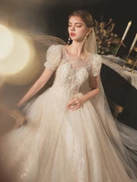 luxury champagne wedding dresses o neck puff sleeve a line sequins shining lace beaded princess arabian elegance bridal gowns