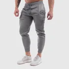 Мужские повседневные брюки для пробежек спортивные штаны мужские тренажерные залы Фитнес Спортивные штаны Новые Модные с принтом человек-мускулы, костюм на все Фитнес тренировочные брюки