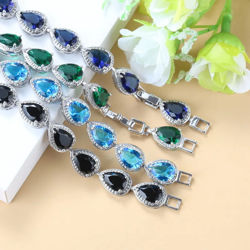 Очаровательный браслет серебряного цвета с фиолетовым цирконом модные