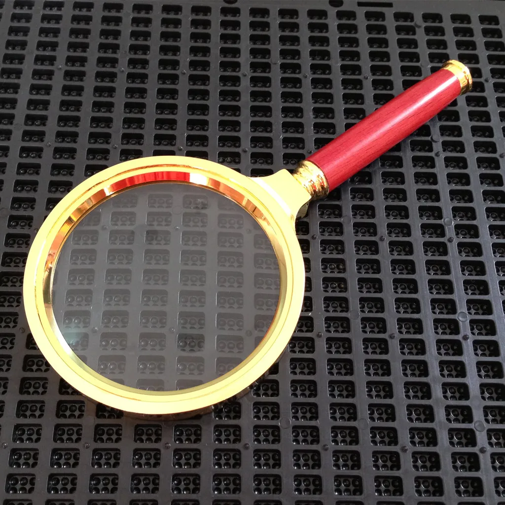 Лупа с золотистой оправой для ювелирных изделий ручная 80 мм 10 кратным