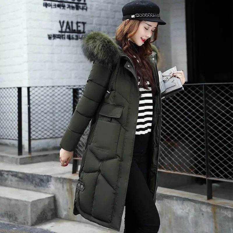 Женский пуховик с большими карманами и меховым воротником | Женская одежда