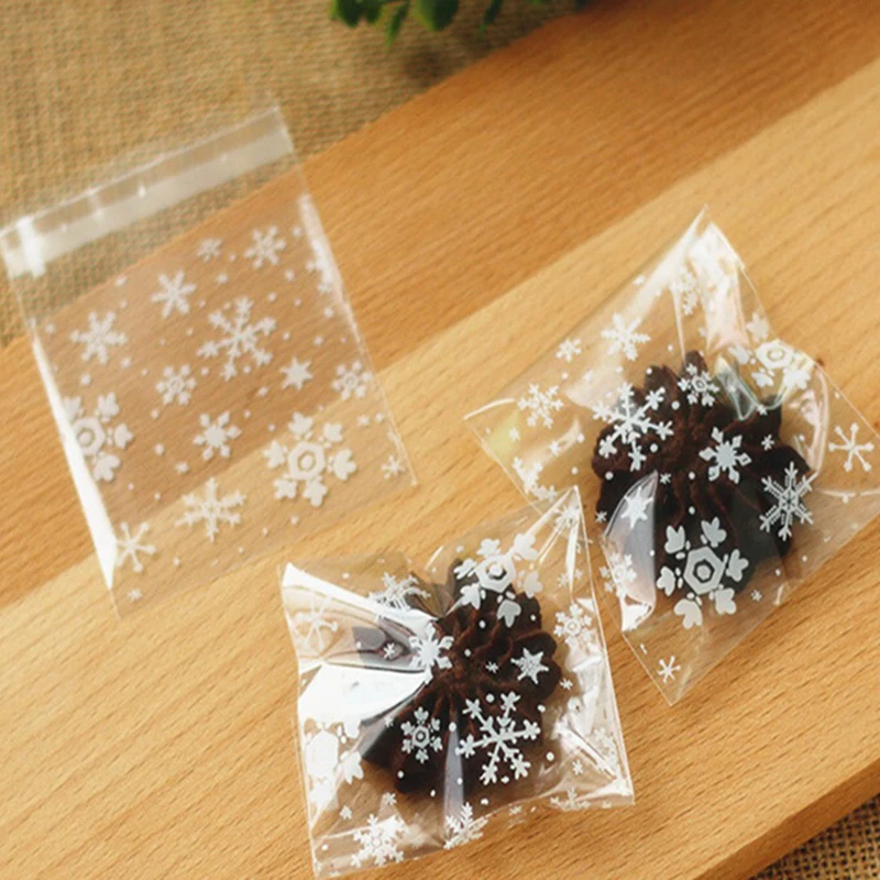 

50Pcs/lot New Arrival 10x10cm Clear Christmas Snowflake Cookie Bag,Plastic Cellophane Self Adhesive Seal,Bakery Gift Cello Bags
