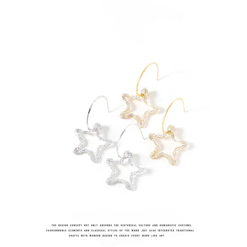

GU-142 Super flashing zircon star earrings S925 silver needle hollow five-pointed star crystal earrings fashion wild design