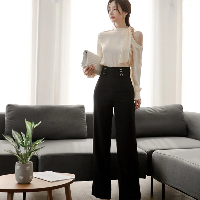 

Женский офисный костюм из двух предметов, модная Свободная рубашка с открытыми плечами и бантом и черные широкие брюки с высокой талией, осе...