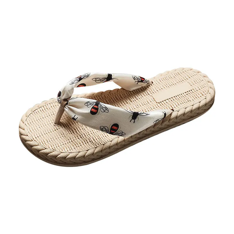 

2021 imitation straw sandals, women's wear rubber at the end of one word procrastinates flat beach female drag
