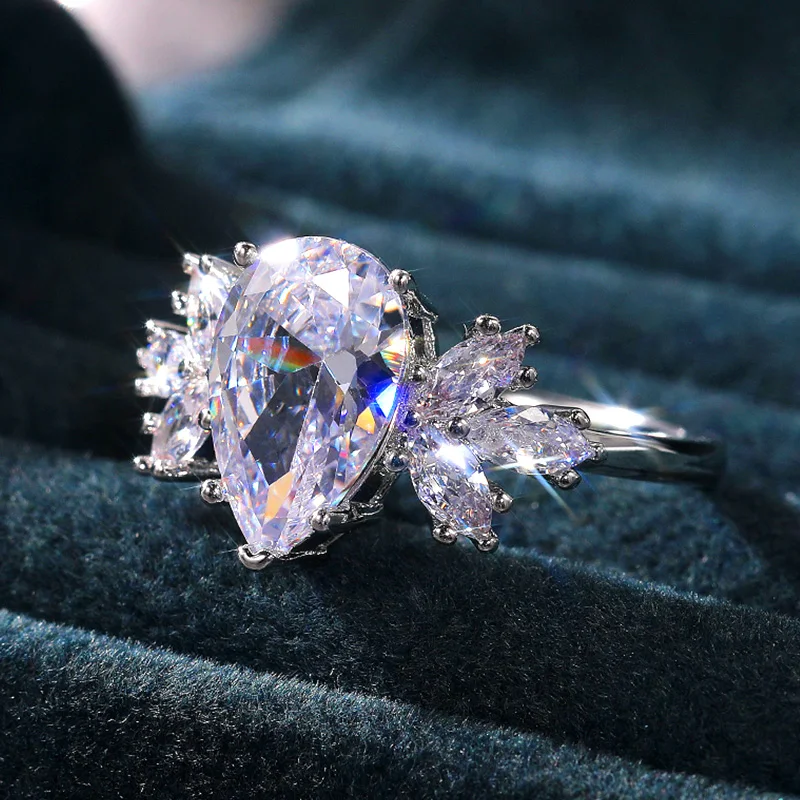 

Huitan Romantic Pear-shaped CZ Women Wedding Rings Brilliant AAA Cubic Zirconia Novel Design Engagement Ring 2021 Trendy Jewelry