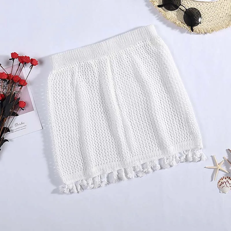 

2021 Boho style knitted hollow beach short skirt fringed cover up for bikini set Beach Dress women tassel bikini cover up