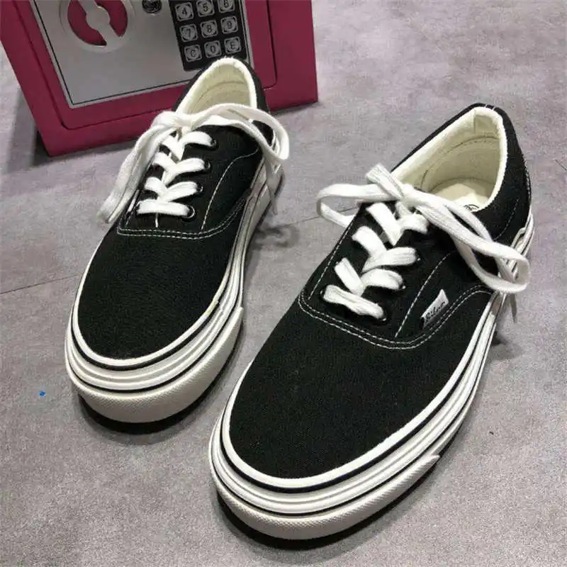 

Flat-bottomed low-cut canvas all-match retro classic style lace-up Japanese personality comfortable large size shoes
