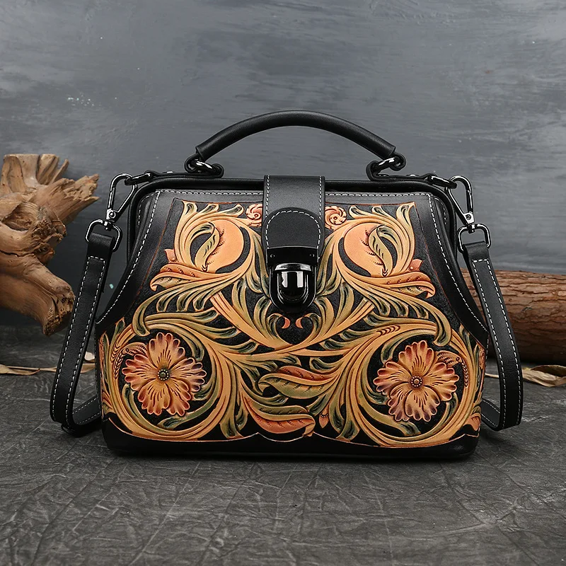 

Hand made leather bag with carved foreskin, cow leather handbag with embossed lock and one shoulder slanting bag