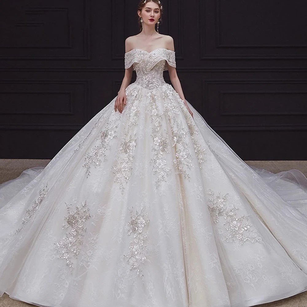 

2021 Luxury Wedding Dress Off Shoulder Elegant Boat Neck Saudi Sweetheart Beaded Crystal Lace Backless Princess Bridal Gown
