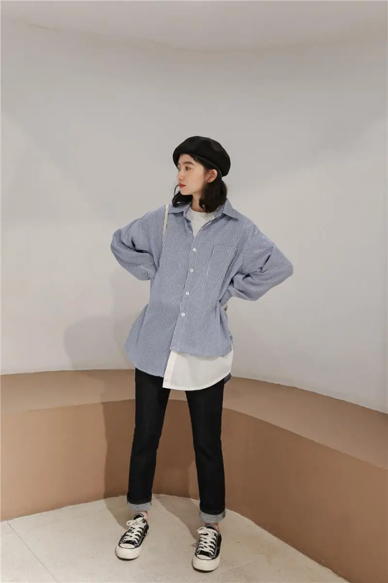 

Korean version of the spring 2021 new Korean version of loose casual pinstripe stitching fake two-piece long-sleeved shirt women