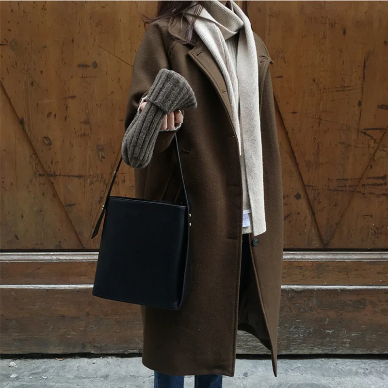 Женское элегантное зимнее шерстяное пальто черного и коричневого цветов длинное