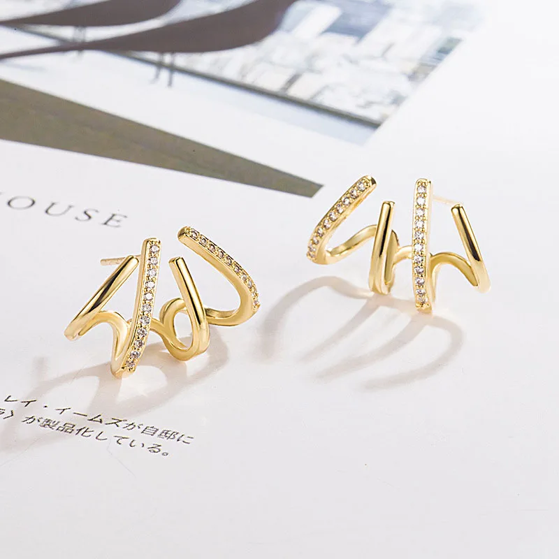 

Four-claw Metal Stud Earrings for Women Hollow Geometric Statement Gold Color Earrings Personality Unusual Earring Trend Jewelry