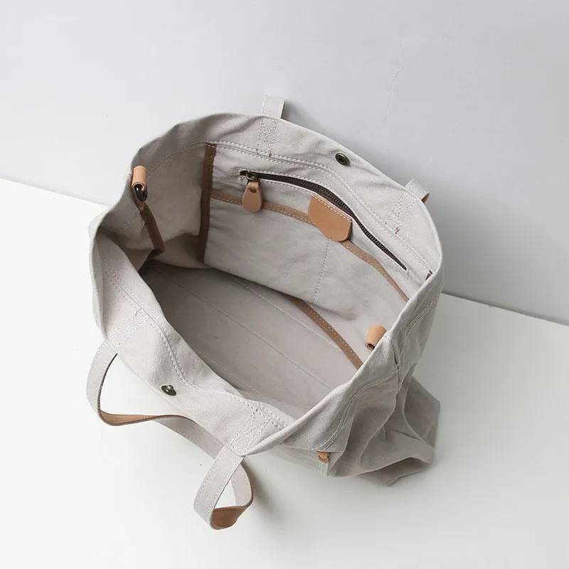 

Simple men's shoulder bag High quality canvas with leather bag Japanese retro style Suitable for shopping men's bags tote