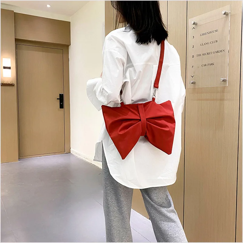 

Cute bow bag female personality fashion underarm messenger bag Girl Korean version of ins casual shoulder bag