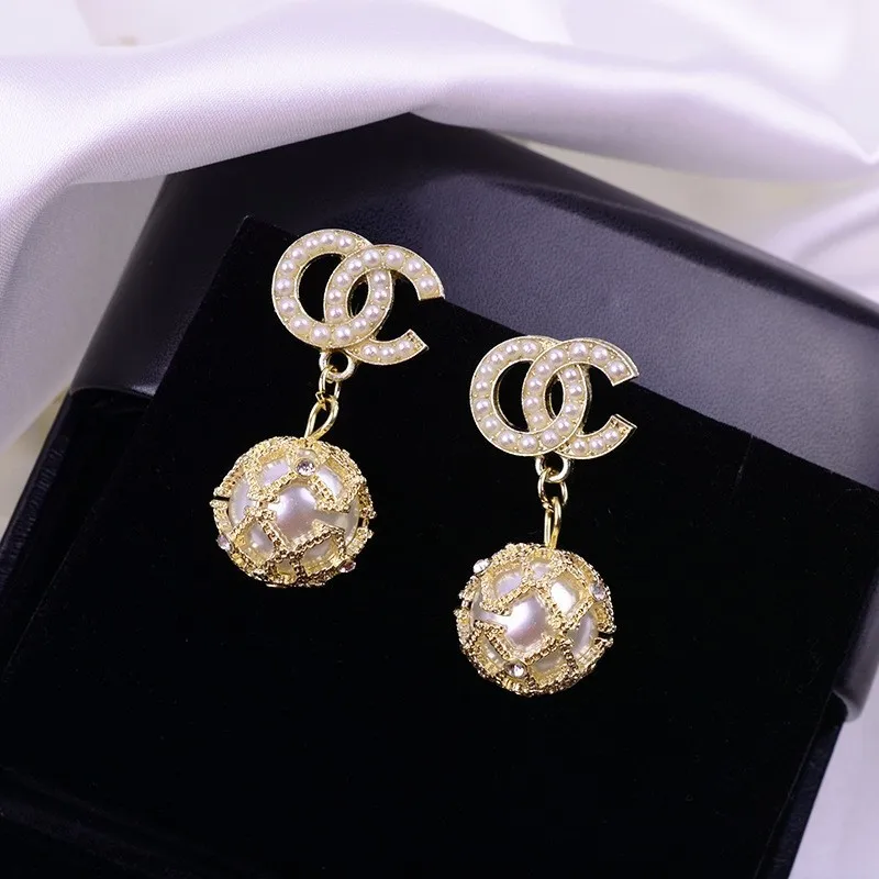 

Double C stud hollow ball pearl earrings for girl's birthday