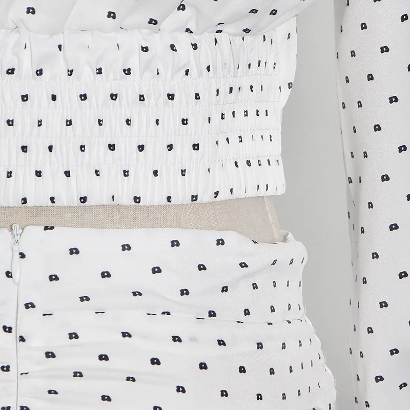 

2021 Spring and Autumn Fashion Two-piece Sweet Temperament V-neck Hollow Bow Shirt + High Waist Mini Skirt Polka Dot Suit Women