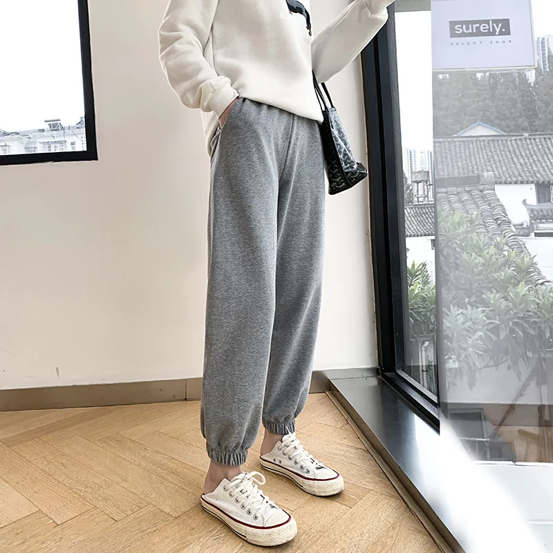 Женские спортивные брюки толстые теплые размера плюс для осени и зимы свободные