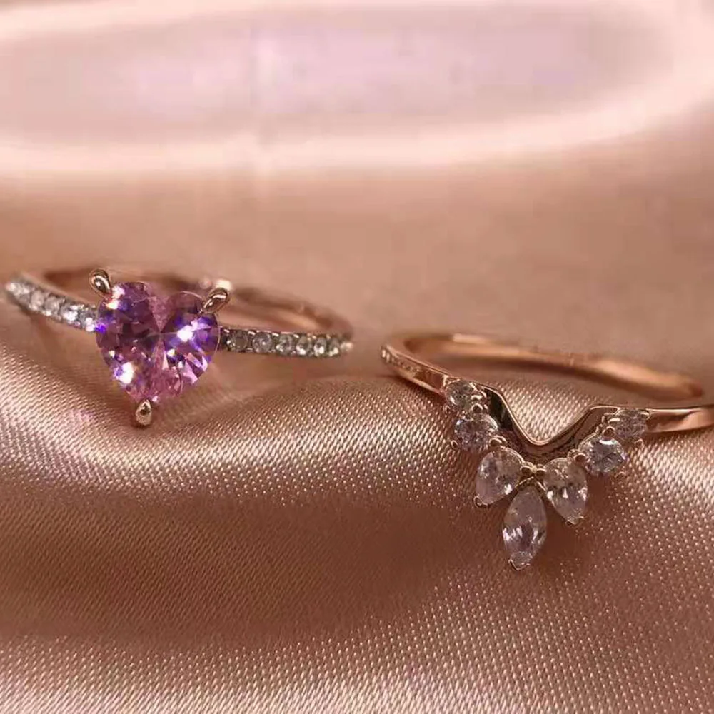 

The new pink zircon crystal love double-layer ring can wear a girl's heart-shaped ring as a Valentine's Day gift