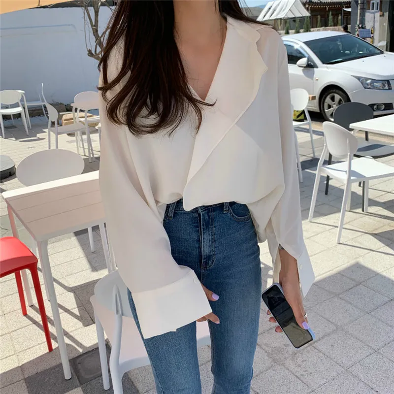 

RUGOD 2021 spring V-neck solid color ruffled design sense long-sleeved temperament shirt women
