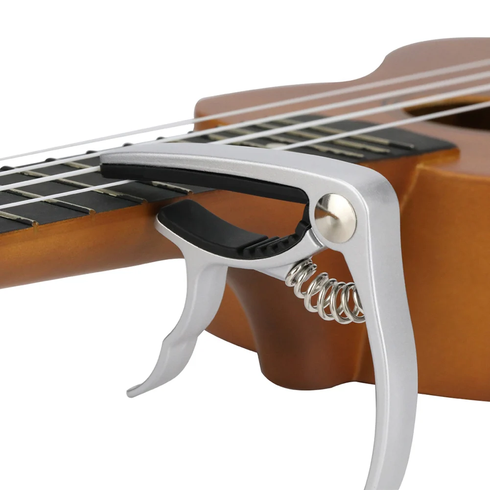 

Electric Acoustic Guitar Ukulele Capo Clamp Spring Clip Rack Tool Portable Accessories EDF88