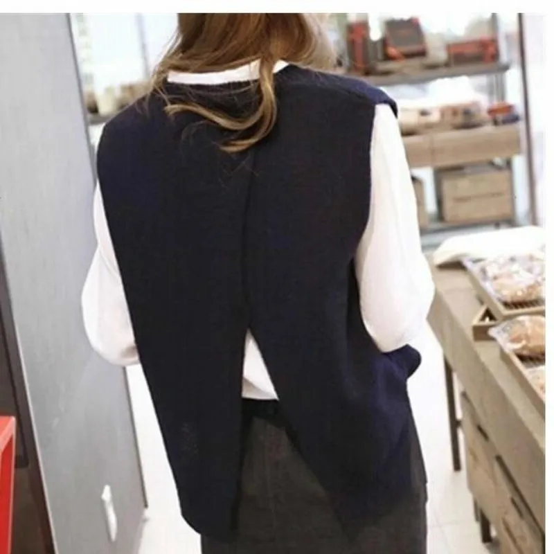 Повседневный серый вязаный пуловер без рукавов с перекрестным разрезом