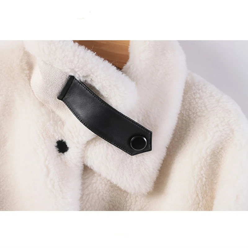 

2020 autumn and winter new wool particle sheep shearing wool coat loose and warm mid-length women's fur coat sheep skin pocket