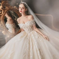 2022 new gorgeous wedding dress luxury sparkly tulle appliques a line beading off the shoulder court train princess bridal gowns