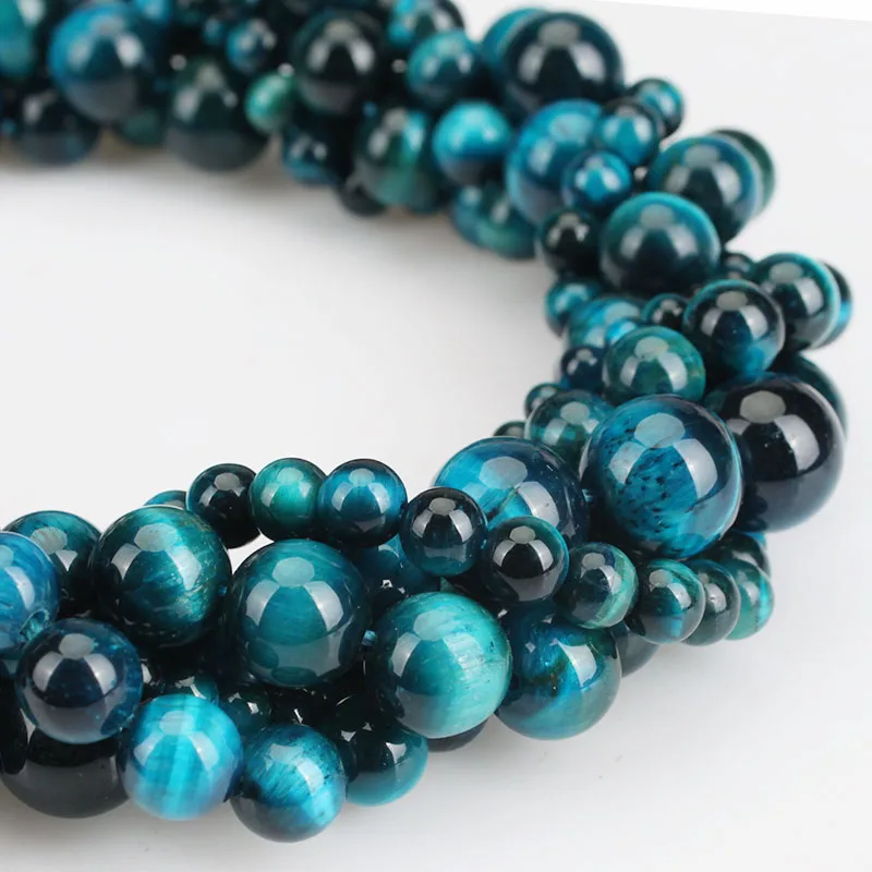 Бусины из натурального камня с кислотным синим цирконием и тигриным глазом