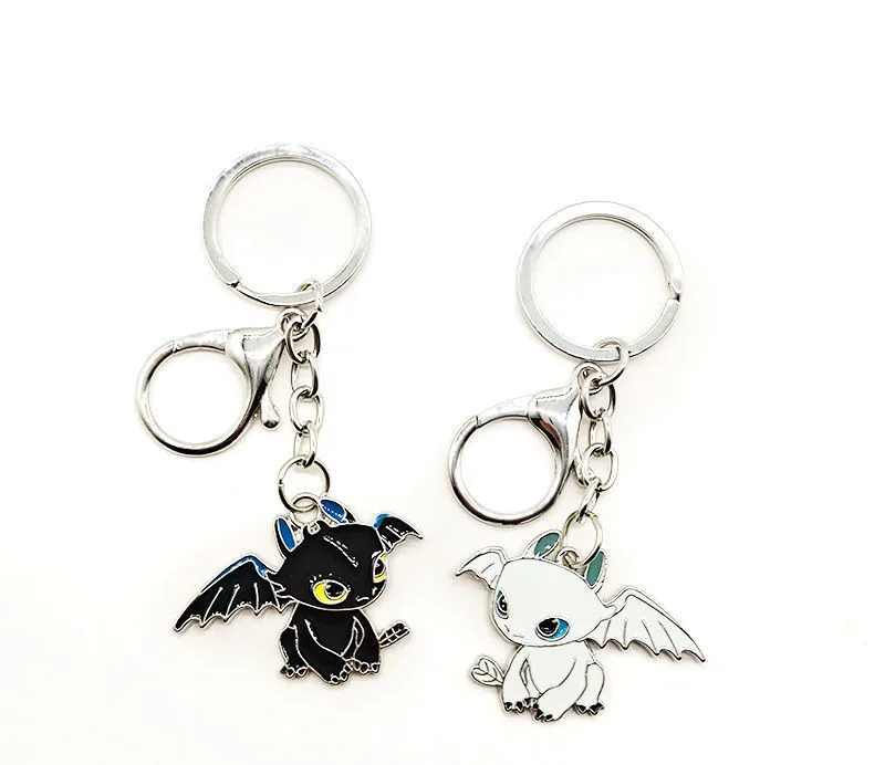 

Little Flying Dragon Key Chain Couple Cartoon Key Ring Charm, Night Shade Light Bag Pendant, Black And White Dragon Keychains