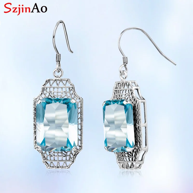 Женские серьги подвески с голубым топазом из серебра 925 пробы драгоценным