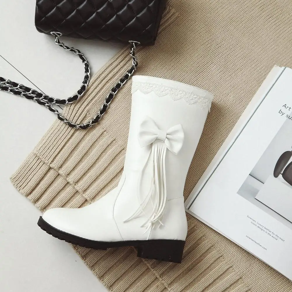 

2019 autumn and winter new female mid-tube wedge with increased tassel Martin boots