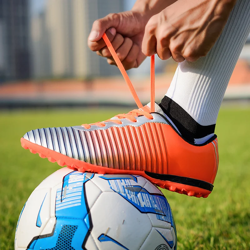 

New children's football shoes training shoes boys and girls sports shoes broken nails football shoes indoor youth unisex