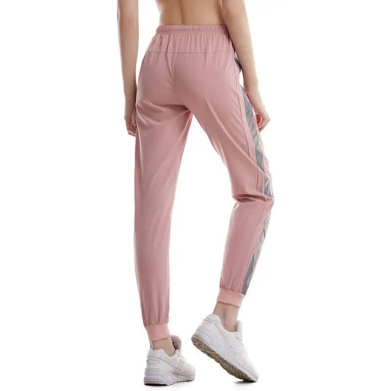 Светоотражающие женские штаны Джоггеры со светоотражающими полосками