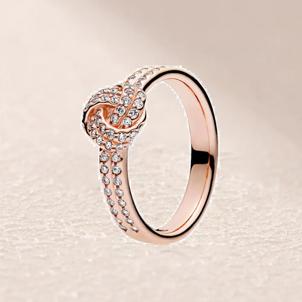 

180997CZ ROSE SPARKLING LOVE KNOT RING