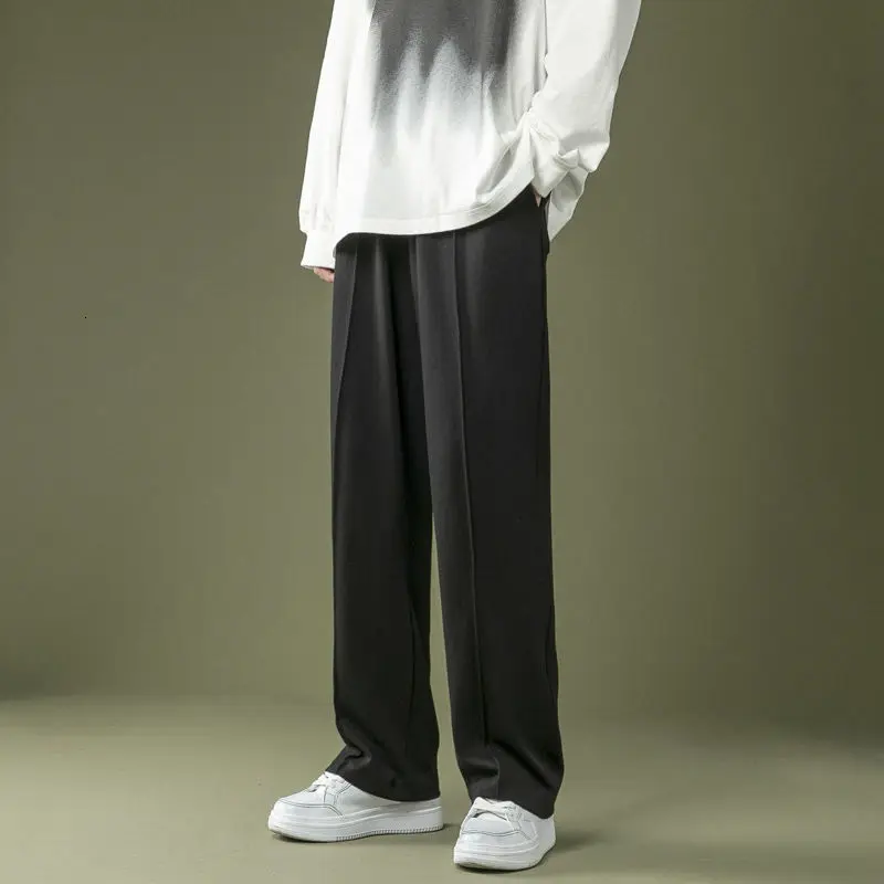 Брюки спортивные мужские однотонные джоггеры Модные свободные штаны в Корейском
