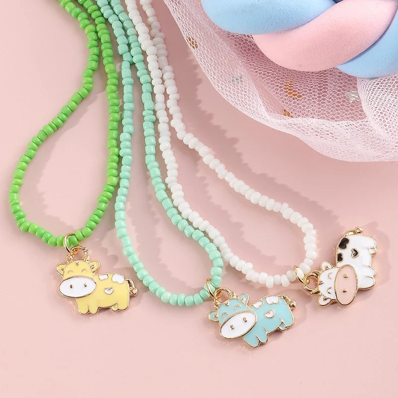 

2021 Wholesale 3pcs/set Cute Childlike Animal Pendant Cow Necklace Multicolor Handmade Rice Bead Necklace Jewelry for Women