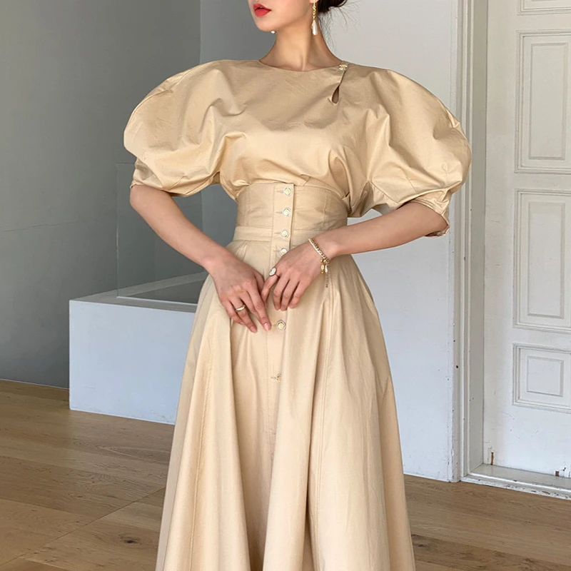 Женское платье с пуговицами сбоку однобортная длинная рубашка круглым вырезом и