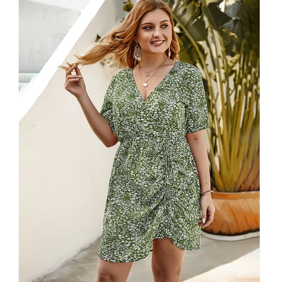 

GXDS Plus Size Ladies Floral Dress 2021 Spring And Summer New Short-Sleeve Sexy Deep V-Neck Irregular Pleated Knee-Length Dress