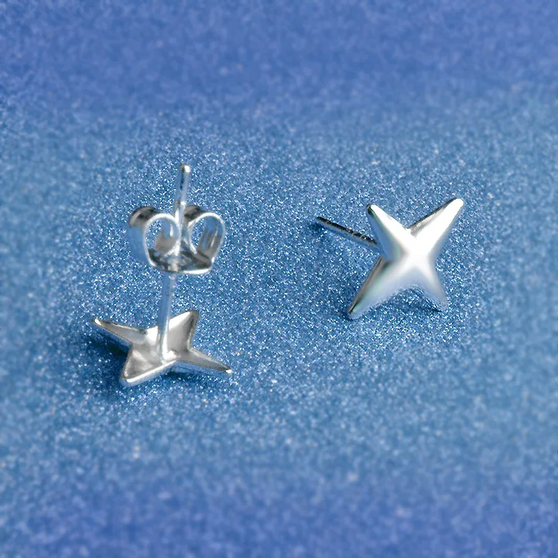 Серьги гвоздики с павлиньими звездами однотонные серьги серебристого цвета