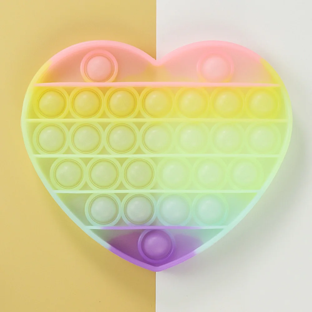 

Флуоресцентная светящаяся игрушка-антистресс в виде радужного сердца