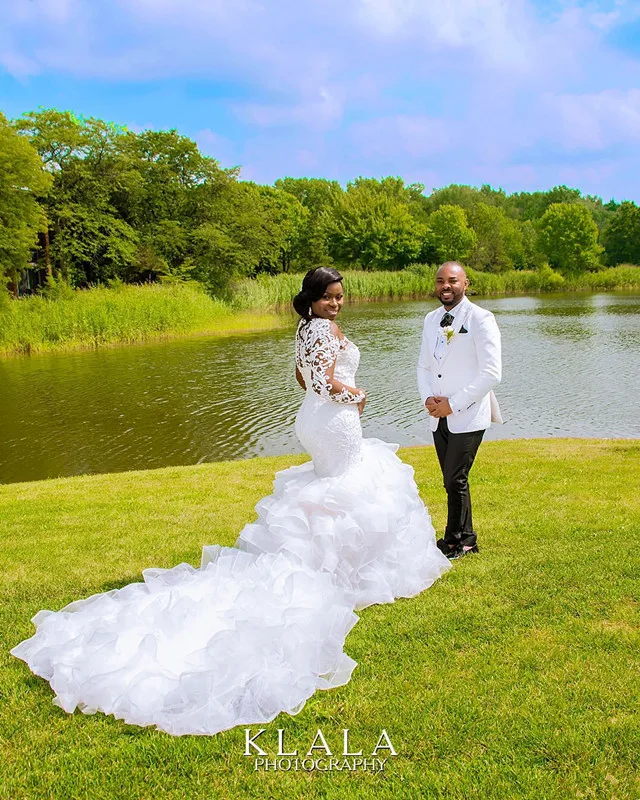 

Plus size African Mermaid Wedding Dresses Sheer O-neck Illusion Lace Applique Long Sleeve Ruffles Cathedral Train Wedding Gown