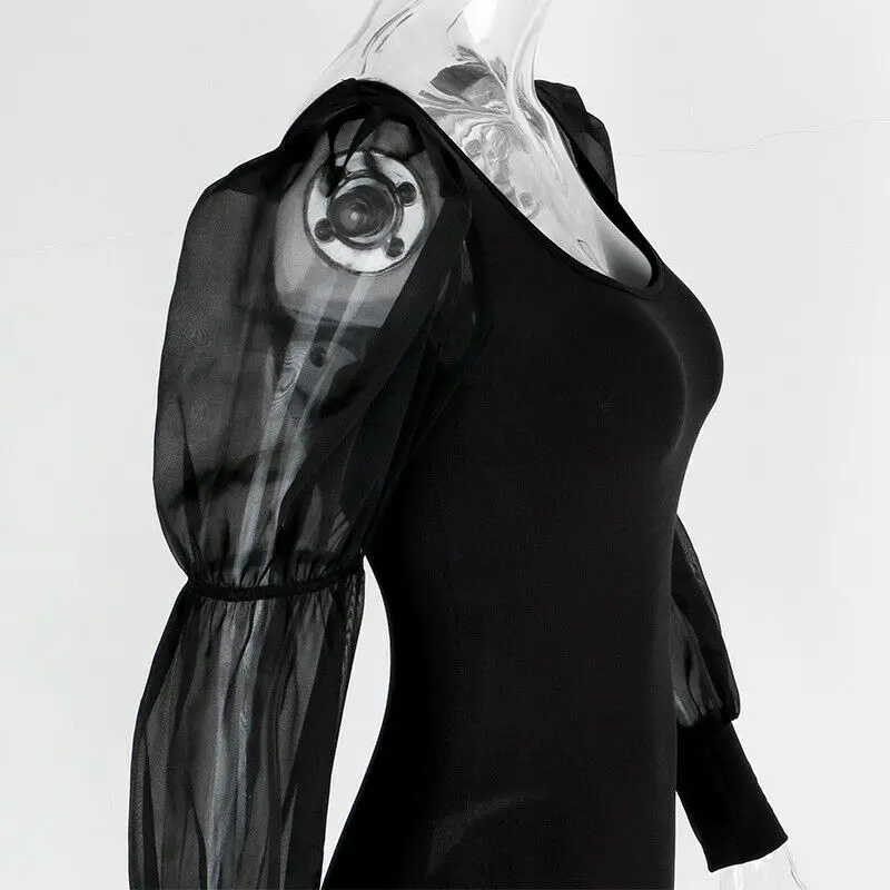 Женский комбинезон с длинным рукавом и буффами однотонный черный повседневный