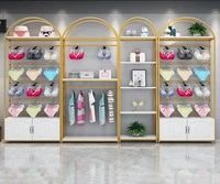 underwear store shelves bra underwear display stand against the wall pajama display cabinet clothing store gold shelf with hooks