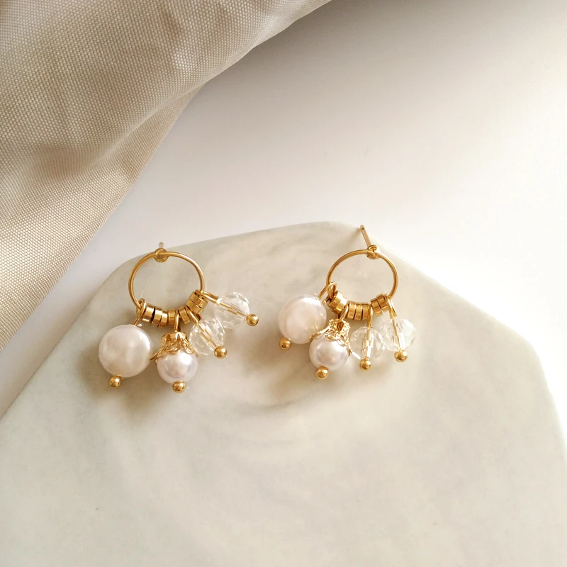 

Temperament is super fairy pearl crystal tassel earrings personality senior circle earrings delicate stud earrings
